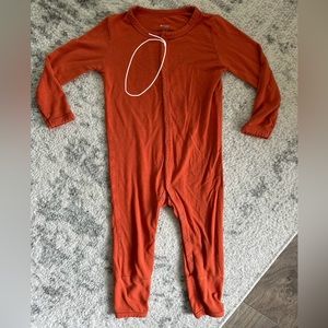 Kyte baby romper in clementine.